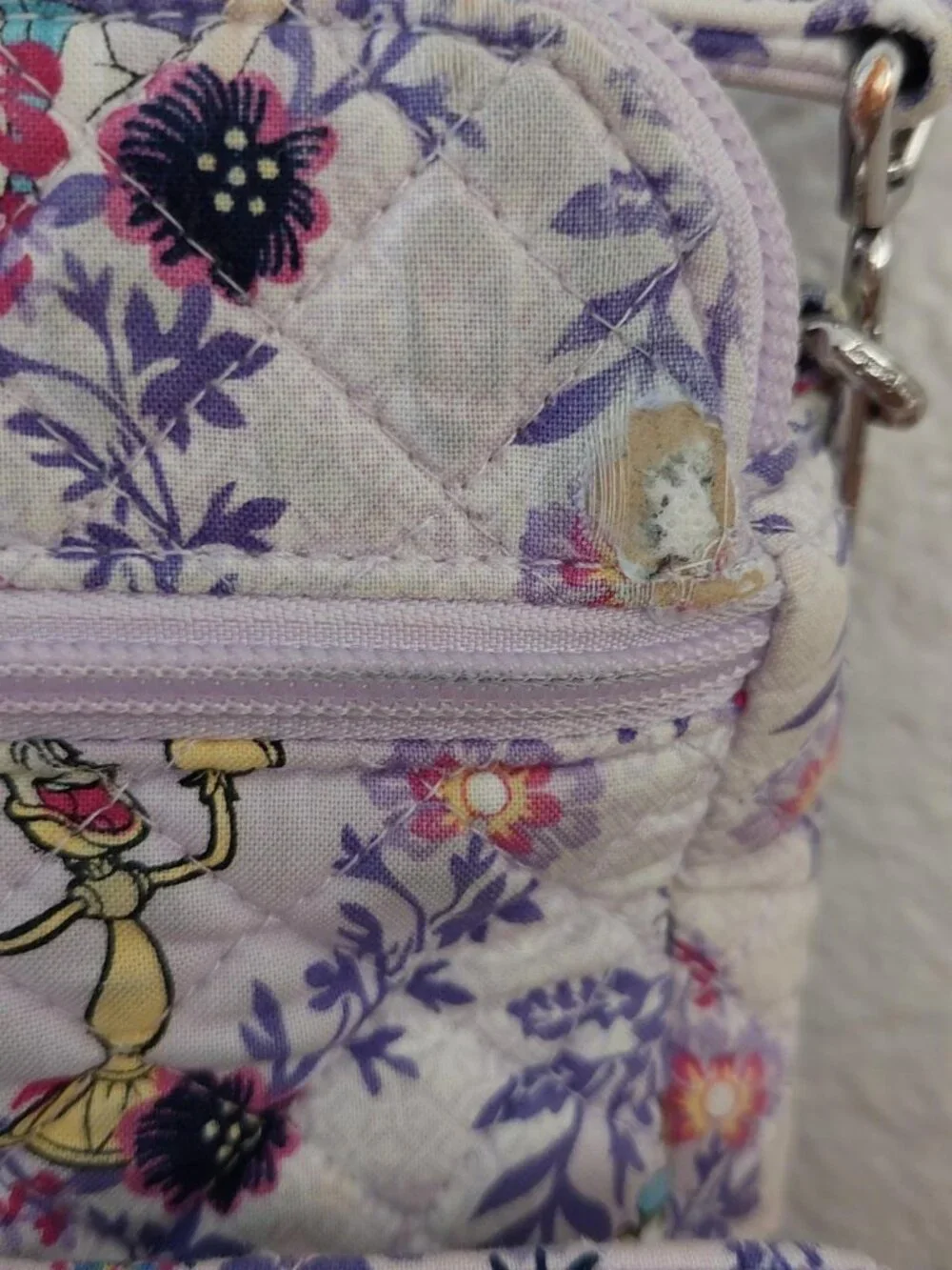 Vera Bradley x Disney triple compartment crossbody bag features the 